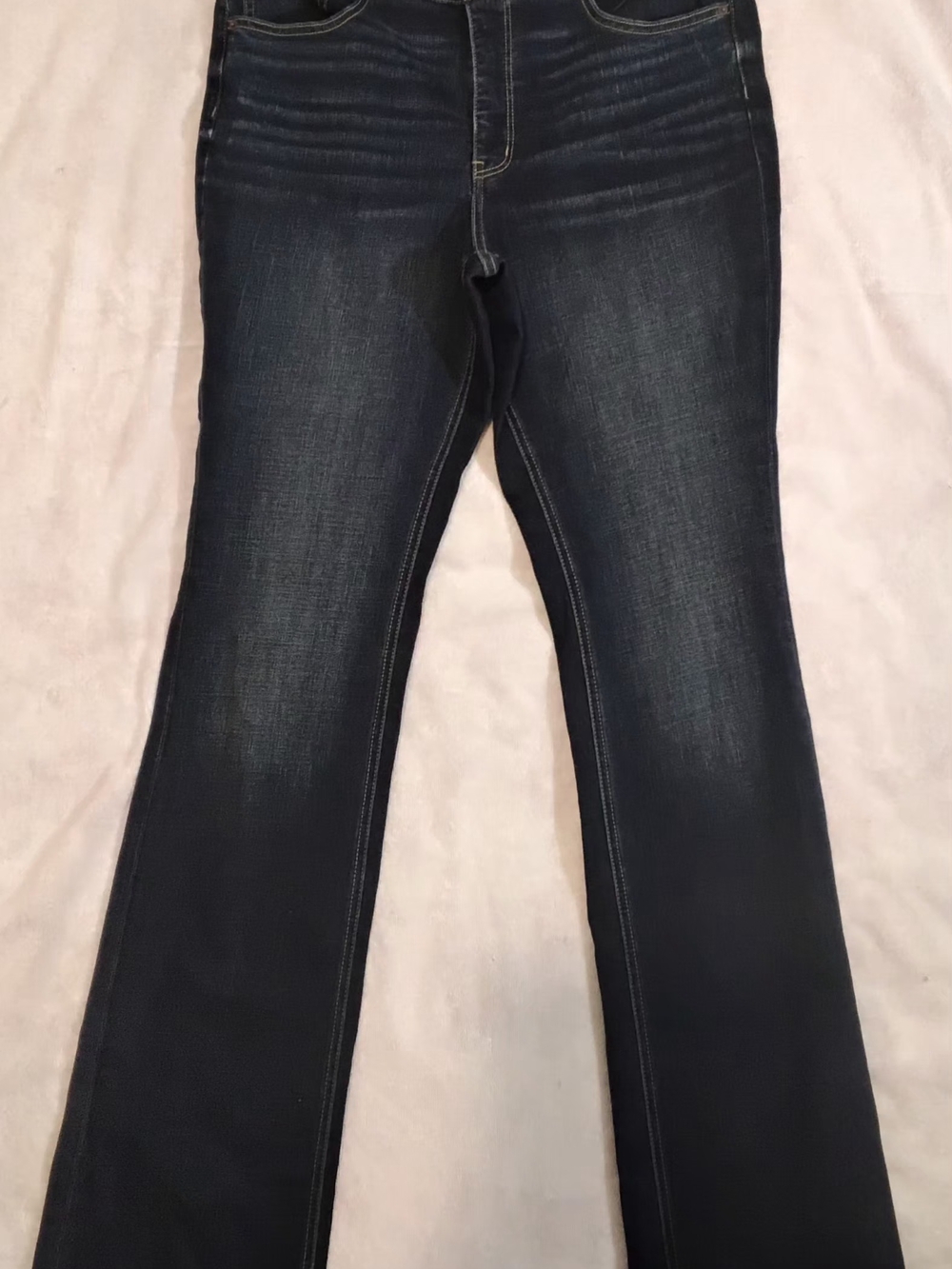 The BKE Parker Dark Wash Blue Bootcut Stretch Jeans are a stylish and versatile
